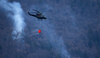 Few 100 firefighters, 4 helicopters and firefighting plane that came to help from Croatia, tried to extinguish forest fire that started in mountains above village Potoce near Preddvor, Slovenia on Monday 28th of March 2022. Their efforts were still continuing on Tuesday, 29th of March 2022.