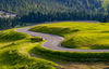 Views over Gardena pass near Selva di Val Gardena, Italy, on sunny summer Monday 26th of June 2023. Gardena pass is pass over which road connects Val Gardena valley and Badia valley in Italian Dolomites.