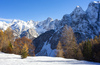 Winter wonderland with trees still in autumn colours is seen near Vrsic pass above Kranjska Gora, Slovenia, on 12th of November 2023. First snow covered higher areas in mountains around Vrsic pass near Kranjska Gora, Slovenia.