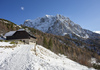 Winter wonderland with trees still in autumn colours is seen near Vrsic pass above Kranjska Gora, Slovenia, on 12th of November 2023. First snow covered higher areas in mountains around Vrsic pass near Kranjska Gora, Slovenia.