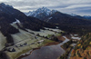 Zelenci wetlands near Kranjska Nora, Slovenia after heavy rainfall on 12th of November 2023. Zelenci are ground source of Sava Dolinka river, where water boils from up to 2 meters deep green lake.
