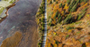 Zelenci wetlands near Kranjska Nora, Slovenia after heavy rainfall on 12th of November 2023. Zelenci are ground source of Sava Dolinka river, where water boils from up to 2 meters deep green lake.