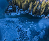 Aerial views to Laghi di Fusine near Tarvisio, Italy, on crispy winter morning of 23rd of December 2023.