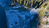 Aerial views to Laghi di Fusine near Tarvisio, Italy, on crispy winter morning of 23rd of December 2023.