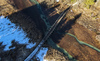 Aerial views to Zelenci meadows near Kranjska Gore, Slovenia, on sunny winter morning of 23rd of December 2023.