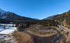 Aerial views to Zelenci meadows near Kranjska Gore, Slovenia, on sunny winter morning of 23rd of December 2023.