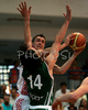 Dalibor Bagaric (no.14) of Croatia shooting over Dragisa Drobnjak (no.14) of Slovenia during preparation match for Olympic qualifications, between Slovenia and Croatia. Preparation match between Slovenia and Croatia was played in Sencur, Slovenia, on Saturday, 28th of June 2008.
