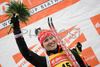Kati Wilhelm of Germany celebrates on the podium after winning the women 7.5 km Sprint Biathlon World Cup race in Anterselva, Italy. Sprint race of Women IBU Biathlon World Cup was held in Anterselva, Italy on 17th of January 2008.
