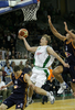 Teemu Rannikko (no. 9) of Union Olimpija attacking during match of Euroleague League between KK Union Olimpija, Ljubljana, Slovenia and Lottomatica Roma, Italy. Match ended with victory of Union Olimpija, who defeated Lottomatica Roma with 82-73. Match between KK Union Olimpija and Lottomatica Roma was played in Tivoli hall in Ljubljana, Slovenia on 1. November 2006.
