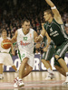 Marko Milic (no. 12) of Union Olimpija (L) in offence while Robertas  Javtokas (no. 19) of Panathinaikos (R) is trying to cover him during match of Euroleague League between KK Union Olimpija, Ljubljana, Slovenia and Panathinaikos Athens, Greece. Match ended with victory of Panathinaikos, who defeated Union Olimpija with 86:65. Match between KK Union Olimpija and Panathinaikos was played in Tivoli hall in Ljubljana, Slovenia on 8. November 2006.
