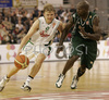Teemu Rannikko (no. 9) of Union Olimpija (L) in offence while Tony Delk (no. 5) of Panathinaikos (R) is trying to cover him during match of Euroleague League between KK Union Olimpija, Ljubljana, Slovenia and Panathinaikos Athens, Greece. Match ended with victory of Panathinaikos, who defeated Union Olimpija with 86:65. Match between KK Union Olimpija and Panathinaikos was played in Tivoli hall in Ljubljana, Slovenia on 8. November 2006.
