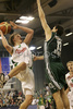 Teemu Rannikko (no. 9) of Union Olimpija (L) is scoring with shoot over Dimitrios Diamantidis (no. 13) of Panathinaikos (R) during match of Euroleague League between KK Union Olimpija, Ljubljana, Slovenia and Panathinaikos Athens, Greece. Match ended with victory of Panathinaikos, who defeated Union Olimpija with 86:65. Match between KK Union Olimpija and Panathinaikos was played in Tivoli hall in Ljubljana, Slovenia on 8. November 2006.
