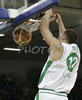 Marko Milic (no. 12) of Union Olimpija scores with slam dunk during match of 5th round of Basketball Euroleague League between KK Union Olimpija, Ljubljana, Slovenia and Partizan Belgrade, Serbia. Match ended with victory of Partizan, who defeated Union Olimpija with 70:71. Match between KK Union Olimpija and Partizan was played in Tivoli hall in Ljubljana, Slovenia on 22. November 2006.
