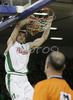 Manuchar Markoishvili (no. 11) of Union Olimpija scores with slam dunk during match of 5th round of Basketball Euroleague League between KK Union Olimpija, Ljubljana, Slovenia and Partizan Belgrade, Serbia. Match ended with victory of Partizan, who defeated Union Olimpija with 70:71. Match between KK Union Olimpija and Partizan was played in Tivoli hall in Ljubljana, Slovenia on 22. November 2006.
