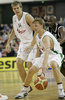 Teemu Rannikko (no. 9) of Union Olimpija, Saulius Kuzminskas (no. 14) of Union Olimpija (L) and Vonteego Cummings (no.25) of Partizan (R) during match of 5th round of Basketball Euroleague League between KK Union Olimpija, Ljubljana, Slovenia and Partizan Belgrade, Serbia. Match ended with victory of Partizan, who defeated Union Olimpija with 70:71. Match between KK Union Olimpija and Partizan was played in Tivoli hall in Ljubljana, Slovenia on 22. November 2006.
