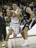 Ivica Jurkovic (no. 13) of Union Olimpija (L) going to score while Predrag Drobnjak (no.18) of Partizan is trying to cover him during match of 5th round of Basketball Euroleague League between KK Union Olimpija, Ljubljana, Slovenia and Partizan Belgrade, Serbia. Match ended with victory of Partizan, who defeated Union Olimpija with 70:71. Match between KK Union Olimpija and Partizan was played in Tivoli hall in Ljubljana, Slovenia on 22. November 2006.
