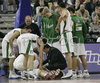 Saulius Kuzminskas (no. 14) of Union Olimpija is laying on floor after getting injured during match of 5th round of Basketball Euroleague League between KK Union Olimpija, Ljubljana, Slovenia and Partizan Belgrade, Serbia. Match ended with victory of Partizan, who defeated Union Olimpija with 70:71. Match between KK Union Olimpija and Partizan was played in Tivoli hall in Ljubljana, Slovenia on 22. November 2006.
