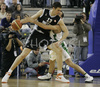 Ivica Jurkovic (no. 13) of Union Olimpija (R) is trying to cover Kosta Perovic (no.13) of Partizan during match of 5th round of Basketball Euroleague League between KK Union Olimpija, Ljubljana, Slovenia and Partizan Belgrade, Serbia. Match ended with victory of Partizan, who defeated Union Olimpija with 70:71. Match between KK Union Olimpija and Partizan was played in Tivoli hall in Ljubljana, Slovenia on 22. November 2006.
