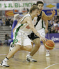 Teemu Rannikko (no. 9) of Union Olimpija (L) attacking while Milenko Tepic (no.4) of Partizan (R) is covering him during match of 5th round of Basketball Euroleague League between KK Union Olimpija, Ljubljana, Slovenia and Partizan Belgrade, Serbia. Match ended with victory of Partizan, who defeated Union Olimpija with 70:71. Match between KK Union Olimpija and Partizan was played in Tivoli hall in Ljubljana, Slovenia on 22. November 2006.
