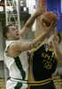 Marko Milic of Union Olimpija (L) and Franko Kastropil of Split Osiguranje (R) during match NLB League between KK Union Olimpija, Ljubljana, Slovenia and Split Osiguranje, Croatia. Match ended with victory of Union Olimpija, who defeated Split Osiguranje with 85:71. Match between KK Union Olimpija and Split Osiguranje was played in Tivoli hall in Ljubljana, Slovenia on 25. November 2006.
