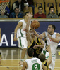 Marko Milic (no. 12) of Union Olimpija trying to score during match NLB League between KK Union Olimpija, Ljubljana, Slovenia and Split Osiguranje, Croatia. Match ended with victory of Union Olimpija, who defeated Split Osiguranje with 85:71. Match between KK Union Olimpija and Split Osiguranje was played in Tivoli hall in Ljubljana, Slovenia on 25. November 2006.
