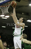 Ivica Jurkovic (no. 13) of Union Olimpija scoring during match of 7th round of Basketball Euroleague League between KK Union Olimpija, Ljubljana, Slovenia and DKV Joventut, Badalona, Spain . Match ended with victory of DKV Joventut, who defeated Union Olimpija with 67:69. Match between KK Union Olimpija and DKV Joventut was played in Tivoli Arena in Ljubljana, Slovenia on 7. December 2006.
