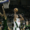Marko Milic (no. 12) of Union Olimpija scoring during match of 7th round of Basketball Euroleague League between KK Union Olimpija, Ljubljana, Slovenia and DKV Joventut, Badalona, Spain . Match ended with victory of DKV Joventut, who defeated Union Olimpija with 67:69. Match between KK Union Olimpija and DKV Joventut was played in Tivoli Arena in Ljubljana, Slovenia on 7. December 2006.
