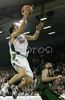 Manuchar Markoishvili (no. 11) of Union Olimpija (L) scoring during match of 7th round of Basketball Euroleague League between KK Union Olimpija, Ljubljana, Slovenia and DKV Joventut, Badalona, Spain . Match ended with victory of DKV Joventut, who defeated Union Olimpija with 67:69. Match between KK Union Olimpija and DKV Joventut was played in Tivoli Arena in Ljubljana, Slovenia on 7. December 2006.
