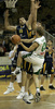 Teemu Rannikko (no. 9) of Union Olimpija (R) trying to score while Denis Vrsaljko (no.15) of Zagreb (L) and Ante Tomic (no.4) of Zagreb (M) are trying to block him during match of NLB League between Union Olimpija, Ljubljana, Slovenia and KK Zagreb, Croatia. Match ended with victory of Union Olimpija, who defeated Zagreb with 87:76. Match between KK Union Olimpija and Zagreb was played in Tivoli Arena in Ljubljana, Slovenia on 9. December 2006.
