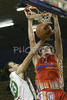 Gasper Vidmar (no.13) of Geoplin Slovan (R) scores with slam dunk over Ivica Jurkovic (no. 13) of Union Olimpija (L) during match of 14th round of Basketball NLB League between KK Union Olimpija, Ljubljana, Slovenia and Geoplin Slovan, Ljubljana, Slovenia. Match ended with victory of Union Olimpija, who defeated Geoplin Slovan with 91:70. Match between Union Olimpija and Geoplin Slovan was played in Tivoli Arena in Ljubljana, Slovenia on 16. December 2006.
