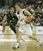 Teemu Rannikko (no. 9) of Union Olimpija (R) and  Berni Rodriguez (no.5) of Unicaja (L) during match of 11th round of Basketball Euroleague League between KK Union Olimpija, Ljubljana, Slovenia and Unicaja, Malaga, Spain. Match ended with victory of Union Olimpija, who defeated Unicaja with 87:59. Match between KK Union Olimpija and Unicaja was played in Tivoli Arena in Ljubljana, Slovenia on 10. January 2007.
