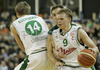 Teemu Rannikko (no. 9) of Union Olimpija (R) attacking while Saulius Kuzminskas (no. 14) of Union Olimpija (L) is making block to  Pepe Sanchez (no.4) of Unicaja (M) during match of 11th round of Basketball Euroleague League between KK Union Olimpija, Ljubljana, Slovenia and Unicaja, Malaga, Spain. Match ended with victory of Union Olimpija, who defeated Unicaja with 87:59. Match between KK Union Olimpija and Unicaja was played in Tivoli Arena in Ljubljana, Slovenia on 10. January 2007.
