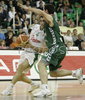Ender Arslan (no. 4) of Union Olimpija (L) and Carlos Cabezas (no.10) of Unicaja (R) during match of 11th round of Basketball Euroleague League between KK Union Olimpija, Ljubljana, Slovenia and Unicaja, Malaga, Spain. Match ended with victory of Union Olimpija, who defeated Unicaja with 87:59. Match between KK Union Olimpija and Unicaja was played in Tivoli Arena in Ljubljana, Slovenia on 10. January 2007.
