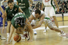 Marko Milic (no. 12) of Union Olimpija (R), Alfonso Sanchez (no.22) of Unicaja (M) and Carlos Cabezas (no.10) of Unicaja (L) fighting for ball during match of 11th round of Basketball Euroleague League between KK Union Olimpija, Ljubljana, Slovenia and Unicaja, Malaga, Spain. Match ended with victory of Union Olimpija, who defeated Unicaja with 87:59. Match between KK Union Olimpija and Unicaja was played in Tivoli Arena in Ljubljana, Slovenia on 10. January 2007.
