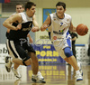 Robert Troha (no.7) of Helios Domzale (R) and Milenko Tepic (no.4) of Partizan (L) during match of 17th round of Basketball NLB  League between Helios Domzale, Slovenia and Partizan Beograd, Serbia. Match ended with victory of Helios Domzale, who defeated Partizan with 79:76. Match between Helios Domzale and Partizan was played in Domzale, Slovenia on 13. January 2007.
