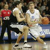 Ziga Zagorc (no.11) of Helios Domzale (R) and Boris Bakic (no.8) of Partizan (L) during match of 17th round of Basketball NLB  League between Helios Domzale, Slovenia and Partizan Beograd, Serbia. Match ended with victory of Helios Domzale, who defeated Partizan with 79:76. Match between Helios Domzale and Partizan was played in Domzale, Slovenia on 13. January 2007.
