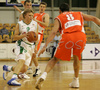 Teemu Rannikko (no. 9) of Union Olimpija (L), Marko Milic (no. 12) of Union Olimpija (white M) and Predrag Suput (no. 8) of Hemofarm (R) during match of NLB League between KK Union Olimpija, Ljubljana, Slovenia and KK Hemofarm, Vrsac, Serbia. Match ended with victory of Hemofarm, who defeated Union Olimpija with 68:73. Match between KK Union Olimpija and KK Hemofarm was played in Tivoli hall in Ljubljana, Slovenia on 21. October 2006.

