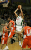 Manuchar Markoishvili (no. 11) of Union Olimpija shooting during match of NLB League between KK Union Olimpija, Ljubljana, Slovenia and KK Hemofarm, Vrsac, Serbia. Match ended with victory of Hemofarm, who defeated Union Olimpija with 68:73. Match between KK Union Olimpija and KK Hemofarm was played in Tivoli hall in Ljubljana, Slovenia on 21. October 2006.
