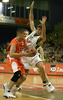 Manuchar Markoishvili (no. 11) of Union Olimpija (R) covering Bojan Bakic (no. 5) of Hemofarm (L) during match of NLB League between KK Union Olimpija, Ljubljana, Slovenia and KK Hemofarm, Vrsac, Serbia. Match ended with victory of Hemofarm, who defeated Union Olimpija with 68:73. Match between KK Union Olimpija and KK Hemofarm was played in Tivoli hall in Ljubljana, Slovenia on 21. October 2006.
