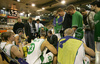 Players of Union Olimpija listening their coach Tomo Mahoric (M) during timeout between match of NLB League between KK Union Olimpija, Ljubljana, Slovenia and KK Hemofarm, Vrsac, Serbia. Match ended with victory of Hemofarm, who defeated Union Olimpija with 68:73. Match between KK Union Olimpija and KK Hemofarm was played in Tivoli hall in Ljubljana, Slovenia on 21. October 2006.
