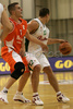 Marko Milic (no. 12) of Union Olimpija (R) and Bojan Bakic (no. 5) of Hemofarm (L)  during match of NLB League between KK Union Olimpija, Ljubljana, Slovenia and KK Hemofarm, Vrsac, Serbia. Match ended with victory of Hemofarm, who defeated Union Olimpija with 68:73. Match between KK Union Olimpija and KK Hemofarm was played in Tivoli hall in Ljubljana, Slovenia on 21. October 2006.
