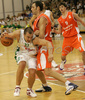 Marko Milic (no. 12) of Union Olimpija (L) attacking during match of NLB League between KK Union Olimpija, Ljubljana, Slovenia and KK Hemofarm, Vrsac, Serbia. Match ended with victory of Hemofarm, who defeated Union Olimpija with 68:73. Match between KK Union Olimpija and KK Hemofarm was played in Tivoli hall in Ljubljana, Slovenia on 21. October 2006.
