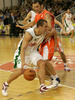 Marko Milic (no. 12) of Union Olimpija (L) attacking during match of NLB League between KK Union Olimpija, Ljubljana, Slovenia and KK Hemofarm, Vrsac, Serbia. Match ended with victory of Hemofarm, who defeated Union Olimpija with 68:73. Match between KK Union Olimpija and KK Hemofarm was played in Tivoli hall in Ljubljana, Slovenia on 21. October 2006.
