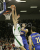 Hasan Rizvic (no.8) of Union Olimpija scoring over Nikola Vujcic (no.7) of Maccabi Elite during match of 13th round of Basketball Euroleague League between KK Union Olimpija, Ljubljana, Slovenia and Maccabi Elite, Tel Aviv, Israel. Match ended with victory of Union Olimpija, who defeated Maccabi Elite with 77:75. Match between KK Union Olimpija and Maccabi Elite was played in Tivoli Arena in Ljubljana, Slovenia on 25. January 2007.
