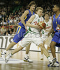 Teemu Rannikko (no.9) of Union Olimpija (M) passed by Simas Jasaitis (no.13) of Maccabi Elite (L) while Jamie Arnold (no.9) of Maccabi Elite (R) is still trying to block him during match of 13th round of Basketball Euroleague League between KK Union Olimpija, Ljubljana, Slovenia and Maccabi Elite, Tel Aviv, Israel. Match ended with victory of Union Olimpija, who defeated Maccabi Elite with 77:75. Match between KK Union Olimpija and Maccabi Elite was played in Tivoli Arena in Ljubljana, Slovenia on 25. January 2007.
