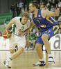 Teemu Rannikko (no.9) of Union Olimpija (L) attacking while Nikola Vujcic (no.7) of Maccabi Elite (R) is trying to block him during match of 13th round of Basketball Euroleague League between KK Union Olimpija, Ljubljana, Slovenia and Maccabi Elite, Tel Aviv, Israel. Match ended with victory of Union Olimpija, who defeated Maccabi Elite with 77:75. Match between KK Union Olimpija and Maccabi Elite was played in Tivoli Arena in Ljubljana, Slovenia on 25. January 2007.

