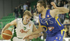 Teemu Rannikko (no.9) of Union Olimpija (L) attacking while Nikola Vujcic (no.7) of Maccabi Elite (R) is trying to block him during match of 13th round of Basketball Euroleague League between KK Union Olimpija, Ljubljana, Slovenia and Maccabi Elite, Tel Aviv, Israel. Match ended with victory of Union Olimpija, who defeated Maccabi Elite with 77:75. Match between KK Union Olimpija and Maccabi Elite was played in Tivoli Arena in Ljubljana, Slovenia on 25. January 2007.
