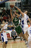 Manuchar Markoishvili (no. 11) of Union Olimpija (M) jumping for ball with Aleksej Laskevic (no.15) of Helios Domzale (R) while Robert Troha (no.7) of Helios Domzale watching this fight for ball during final match of Spar Cup between KK Union Olimpija, Ljubljana, Slovenia and Helios Domzale, Slovenia. Match ended with victory of Helios Domzale, who defeated Union Olimpija with XX:XX. Match between KK Union Olimpija and Helios Domzale was played in Kodeljevo hall in Ljubljana, Slovenia on 11. February 2007. during final match of Spar Cup between KK Union Olimpija, Ljubljana, Slovenia and Helios Domzale, Slovenia. Match ended with victory of Helios Domzale, who defeated Union Olimpija with 77:70. Match between KK Union Olimpija and Helios Domzale was played in Kodeljevo hall in Ljubljana, Slovenia on 11. February 2007.
