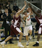 Teemu Rannikko (no.9) of Union Olimpija (M) going through defense of KK Bosna during NLB league match of 21. round between KK Union Olimpija, Ljubljana, Slovenia and KK Bosna Asa BH Telecom, Sarajevo, Bosnia and Hercegovina. Match ended with victory of Union Olimpija, who defeated KK Bosna ASA BTH with 93:68. Match between KK Union Olimpija and KK Bosna Asa BHT was played in Tivoli Arena in Ljubljana, Slovenia on 17. February 2007.
