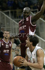 Goran Jurak (no.4) of Union Olimpija (R) trying to score, while Clarence Gilbert (no.4) of KK Bosna (L) is trying to block him during NLB league match of 21. round between KK Union Olimpija, Ljubljana, Slovenia and KK Bosna Asa BH Telecom, Sarajevo, Bosnia and Hercegovina. Match ended with victory of Union Olimpija, who defeated KK Bosna ASA BTH with 93:68. Match between KK Union Olimpija and KK Bosna Asa BHT was played in Tivoli Arena in Ljubljana, Slovenia on 17. February 2007.
